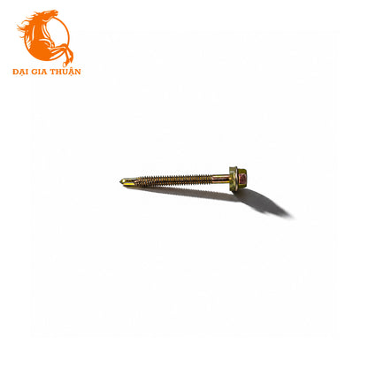 A Vít tôn xà sắt xi mạ vàng ron trắng 60mm with a hex head and a red rubber seal, shown on a plain white background with a cast shadow. The orange logo for 'Đại Gia Thuận' is visible in the top-left corner.